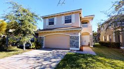 Pre-foreclosure in  NW LEONARDO CIR Port Saint Lucie, FL 34986