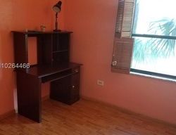 Pre-foreclosure in  N MISSIONWOOD CIR # B-27 Hollywood, FL 33025