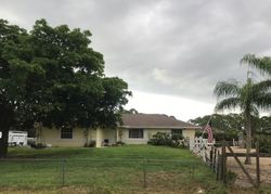 Pre-foreclosure Listing in 85TH RD N WEST PALM BEACH, FL 33412