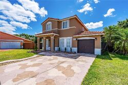 Pre-foreclosure in  SW 174TH ST Miami, FL 33177