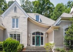 Pre-foreclosure in  GROGANS FERRY RD Atlanta, GA 30350
