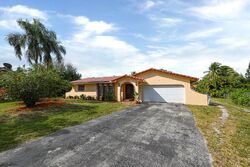 Pre-foreclosure in  NW 107TH AVE Pompano Beach, FL 33065