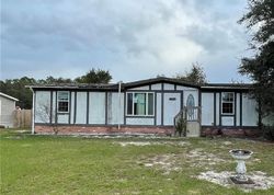 Pre-foreclosure in  SE 55TH PL Ocklawaha, FL 32179