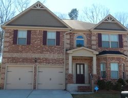 Pre-foreclosure in  STILLMIST DR Fairburn, GA 30213