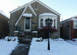 Pre-foreclosure in  N MEADE AVE Chicago, IL 60630