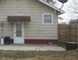 Pre-foreclosure in  E 14TH ST Higginsville, MO 64037