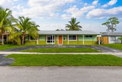 Pre-foreclosure in  NW 10TH ST Pompano Beach, FL 33066