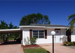 Pre-foreclosure Listing in DAWN FLOWER CIR LEHIGH ACRES, FL 33936