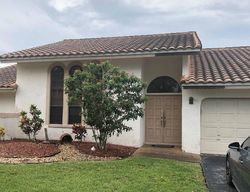 Pre-foreclosure in  NW 64TH LN Pompano Beach, FL 33067