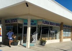 Pre-foreclosure in  MANDALAY AVE Clearwater Beach, FL 33767