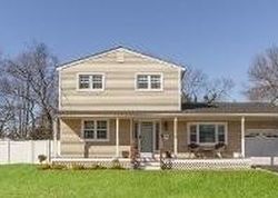 Pre-foreclosure in  COUNTRY GREENS DR Bellport, NY 11713