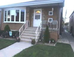 Pre-foreclosure in  W 64TH PL Chicago, IL 60638