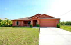 Pre-foreclosure in  NW 14TH TER Cape Coral, FL 33993
