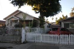 Pre-foreclosure in  E 33RD ST Los Angeles, CA 90011