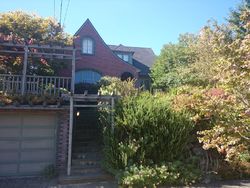 Pre-foreclosure Listing in 33RD AVE S SEATTLE, WA 98144