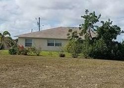 Pre-foreclosure in  NW 6TH CT Cape Coral, FL 33993
