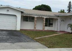 Pre-foreclosure in  NE 39TH CT Pompano Beach, FL 33064