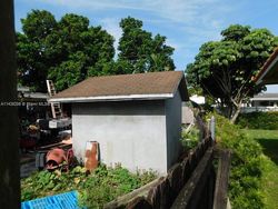 Pre-foreclosure in  W 8TH LN Hialeah, FL 33012