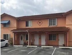 Pre-foreclosure in  W 70TH ST UNIT 201 Hialeah, FL 33018