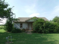 Pre-foreclosure in  HARRISON AVE NW Piedmont, OK 73078