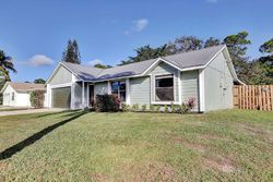 Pre-foreclosure in  SE CROSSPOINT DR Port Saint Lucie, FL 34983