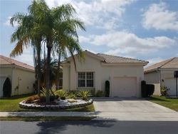Pre-foreclosure in  NW 32ND ST Pompano Beach, FL 33063