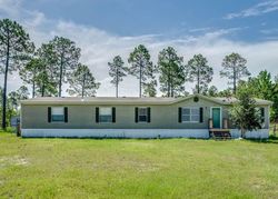 Pre-foreclosure in  WHITE WESTERN SPRINGS RD Panama City, FL 32409