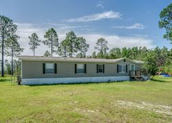 Pre-foreclosure in  WHITE WESTERN SPRINGS RD Panama City, FL 32409