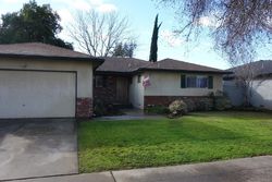 Pre-foreclosure in  E ROBINWOOD LN Fresno, CA 93710
