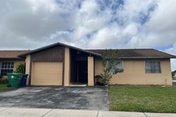 Pre-foreclosure in  SW 96TH TER Hollywood, FL 33025