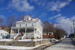 Pre-foreclosure in  BALDWIN ST Laconia, NH 03246