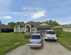 Pre-foreclosure in  BISCAYNE AVE NW Palm Bay, FL 32907