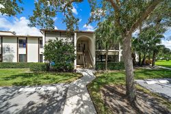 Pre-foreclosure Listing in SW SILVER PINE WAY APT 118-D2 PALM CITY, FL 34990
