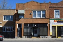 Pre-foreclosure in  W GRAND AVE Chicago, IL 60651