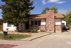 Pre-foreclosure in  E EXPOSITION AVE Aurora, CO 80012