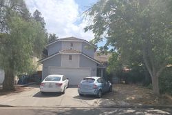Pre-foreclosure in  W WRENWOOD AVE Fresno, CA 93711