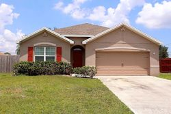 Pre-foreclosure in  SW FALCON CIR Port Saint Lucie, FL 34953