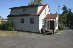 Pre-foreclosure in  E PORTLAND AVE Tacoma, WA 98404