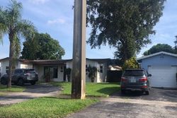 Pre-foreclosure in  THOMAS ST Hollywood, FL 33021