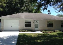 Pre-foreclosure in  ZEPHYR LILY PL Palm Coast, FL 32164