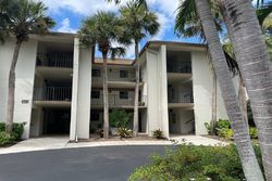 Pre-foreclosure in  LAKE LOUISE CIR UNIT 102 Naples, FL 34110