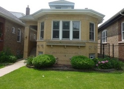 Pre-foreclosure in  W PARKER AVE Chicago, IL 60639