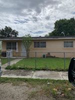 Pre-foreclosure in  NW 32ND CT Miami, FL 33125