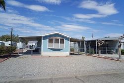 Pre-foreclosure in  S RANCHITA DR Fort Mohave, AZ 86426