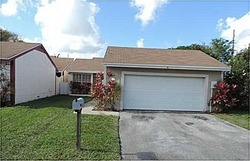 Pre-foreclosure in  REDSTART CT Homestead, FL 33035