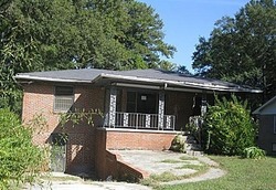Pre-foreclosure in  WOODS DR NW Atlanta, GA 30318