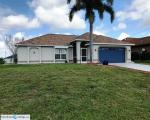 Pre-foreclosure in  NW 18TH ST Cape Coral, FL 33993