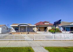 Pre-foreclosure in  E 56TH ST Los Angeles, CA 90011