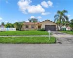 Pre-foreclosure in  SW 122ND CT Homestead, FL 33032