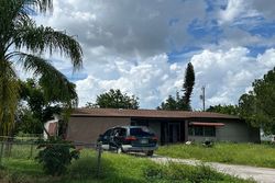 Pre-foreclosure in  JERSEY RD W Lehigh Acres, FL 33936